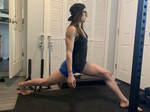 woman doing split lunge stretch